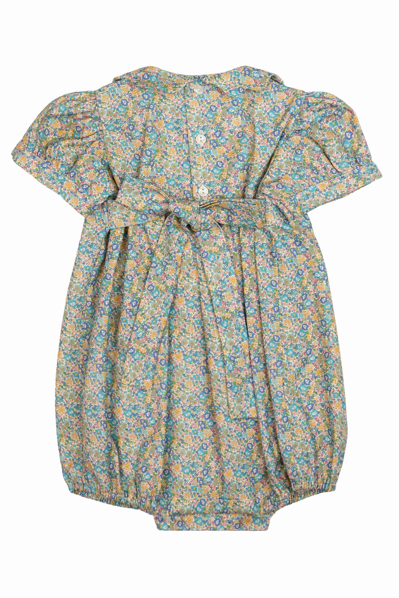 PUNCHED FLOWER ROMPER WITH SMOCK STITCHING